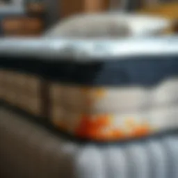 Detailed view of a used box spring showing wear and tear