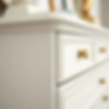 Close-up of narrow white dresser showcasing intricate design details