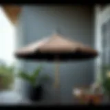 Elegant small porch umbrella paired with a sturdy stand