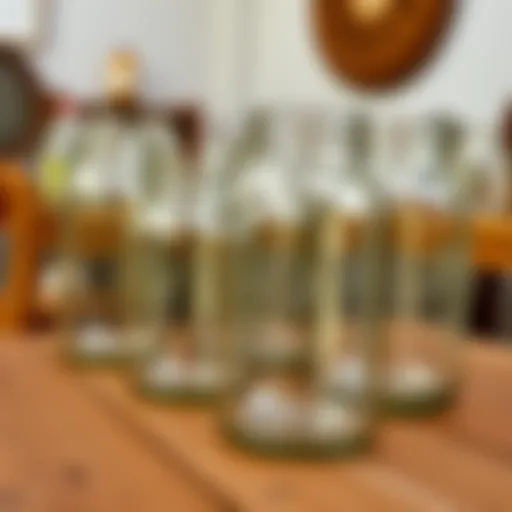 A collection of vintage large mason jars displayed on a rustic wooden table.